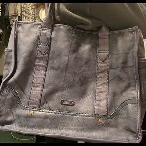 Frye tote in used but good condition.